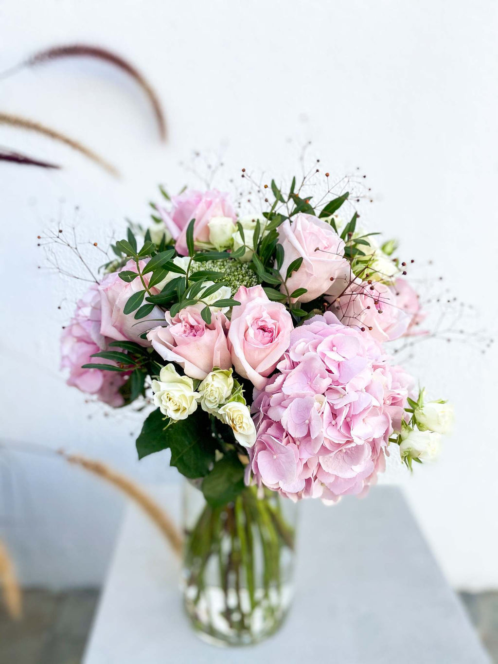 Alix bouquet by Margot Floral Design. A fresh flower bouquet composed of Pink Hydrangeas, Baby Pink O'Hara Roses, White O'Hara Roses, and Foliage. Large size.