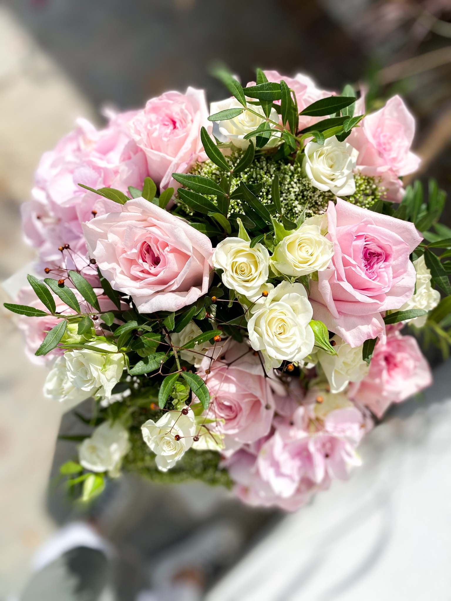 Alix bouquet by Margot Floral Design. A fresh flower bouquet composed of Pink Hydrangeas, Baby Pink O'Hara Roses, White O'Hara Roses, and Foliage. Large size.