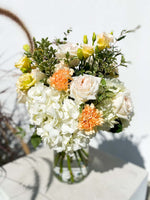 Load image into Gallery viewer, Gabriella bouquet by Margot Floral Design. A fresh flower bouquet composed of Pink Roses, White Hydrangeas, Orange and Yellow Carnations. Medium size.
