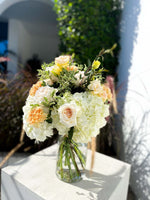 Load image into Gallery viewer, Gabriella bouquet by Margot Floral Design. A fresh flower bouquet composed of Pink Roses, White Hydrangeas, Orange and Yellow Carnations. Medium size.

